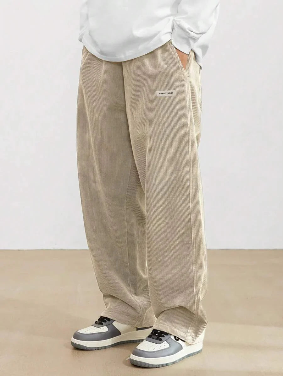 Męskie spodnie casual o luźnym kroju z elastyczną talią - Beige